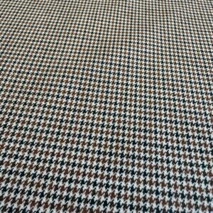 This fabric has a width of 150cm and a weight of 350 (g/m2). It is a woven fabric with a small fragrance texture, perfect for specific uses such as suits, jackets, and cotton clothing. With its medium-heavy weight composition, this fabric offers structure and durability while still providing some breathability, making it suitable for both summer and spring seasons. It provides enough weight to maintain the shape of garments like suits and jackets, ensuring they look polished and sharp. The Woven Small Fragrance Fabric features a unique texture that adds visual and tactile interest to your clothing items. The small fragrance texture also adds a subtle and pleasant scent to the fabric, enhancing the wearing experience. The fabric’s specialty in suits, jackets, and cotton clothing makes it a versatile choice for creating stylish and comfortable garments. Its medium-heavy weight offers durability and longevity, ensuring your garments withstand regular wear. The Medium-Heavy Weight Woven Small Fragrance Fabric is a practical and reliable option that can be used for creating garments specifically tailored for summer or spring. Its unique texture, medium-heavy weight, and subtle fragrance make it a standout choice for adding sophistication and comfort to your wardrobe.