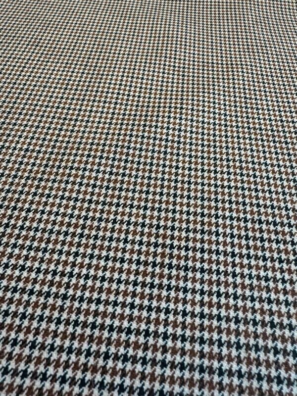 This fabric has a width of 150cm and a weight of 350 (g/m2). It is a woven fabric with a small fragrance texture, perfect for specific uses such as suits, jackets, and cotton clothing. With its medium-heavy weight composition, this fabric offers structure and durability while still providing some breathability, making it suitable for both summer and spring seasons. It provides enough weight to maintain the shape of garments like suits and jackets, ensuring they look polished and sharp. The Woven Small Fragrance Fabric features a unique texture that adds visual and tactile interest to your clothing items. The small fragrance texture also adds a subtle and pleasant scent to the fabric, enhancing the wearing experience. The fabric’s specialty in suits, jackets, and cotton clothing makes it a versatile choice for creating stylish and comfortable garments. Its medium-heavy weight offers durability and longevity, ensuring your garments withstand regular wear. The Medium-Heavy Weight Woven Small Fragrance Fabric is a practical and reliable option that can be used for creating garments specifically tailored for summer or spring. Its unique texture, medium-heavy weight, and subtle fragrance make it a standout choice for adding sophistication and comfort to your wardrobe.